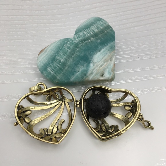 Heart & Flower Aromatherapy Brass tone Locket.  Lava stone included. - Picture 2 of 2